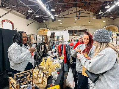 Kimberly Newton selling jewelry at her booth