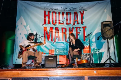 The Holiday Market stage as Gianni Leone and Emma Lamb perform.