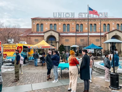 Union Station in Ogden with spectators and food trucks lined up