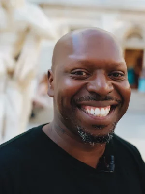 Dr. Rashaad Newsome smiling.