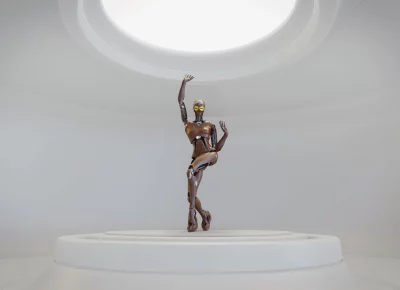 An avatar of a slender wooden encased robot poses, as if voguing, on a white platform in a white room.