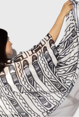 Jessica Wiarda displays a black and white scarf with geometric designs.