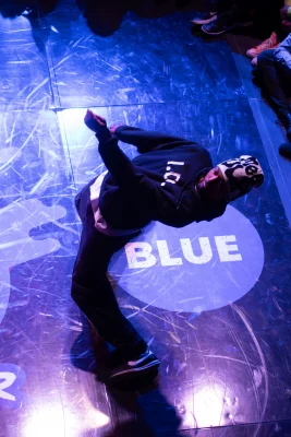 A dancer performs at the Red Bull Dance Your Style Qualifier.