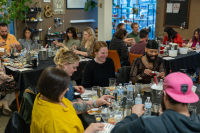 Attendees excitedly make their own drinks. 