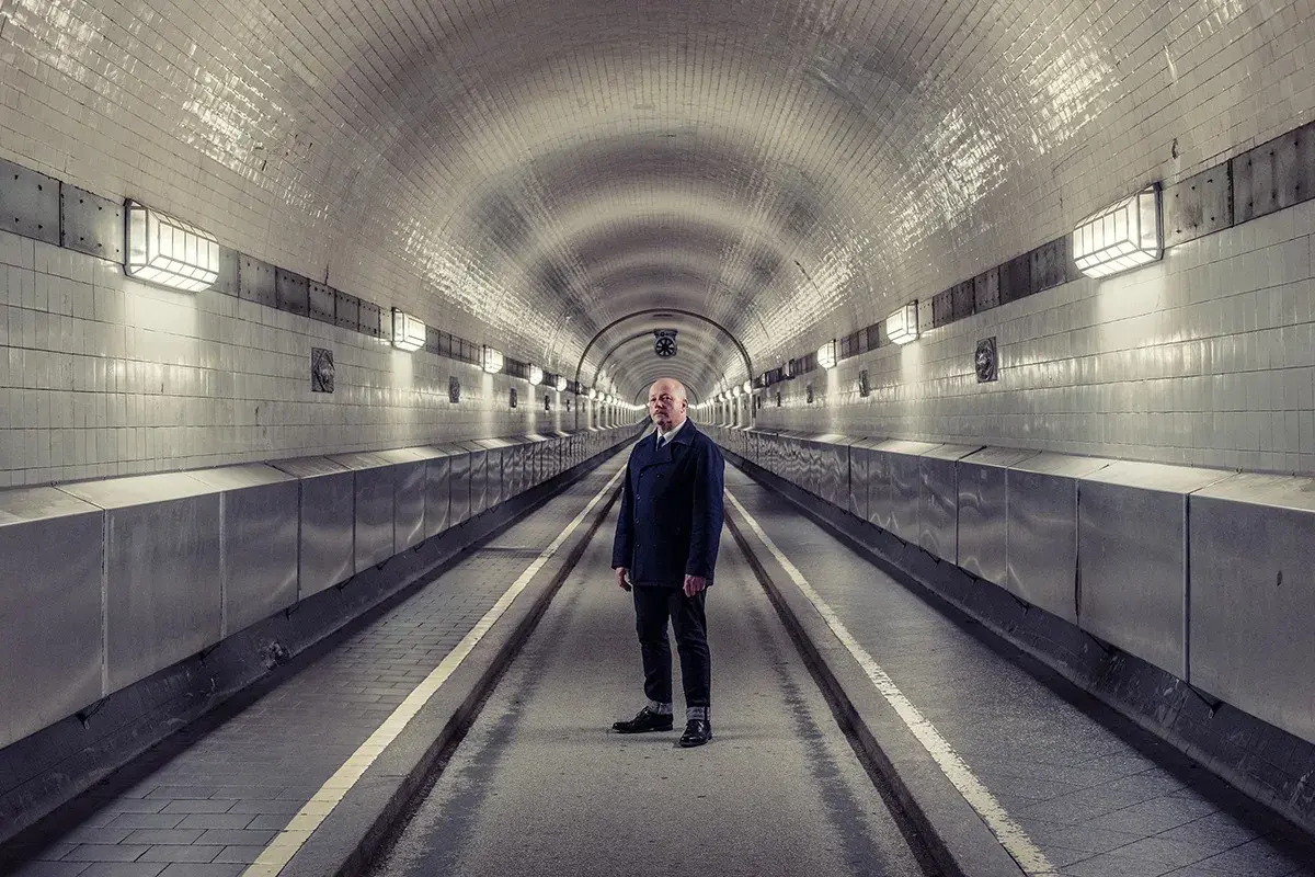 Harris poses in a tunnel