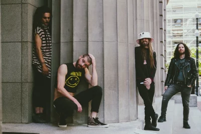 DoomCupcake band standing together.