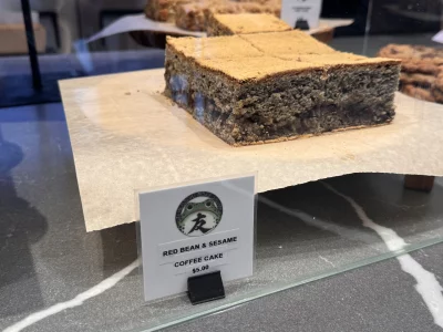 Tomodachi's read bean and sesame coffee cake in a display cake. 