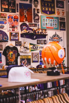 A wall of sports memorabilia at Thrifthood, a vintage streetwear store in Provo, Utah.
