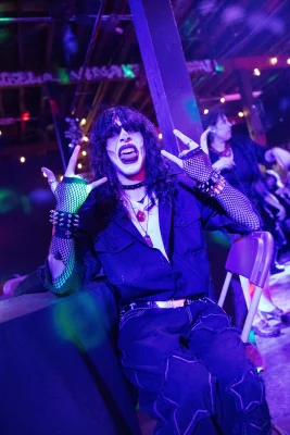 An attendee rocking out to the music.