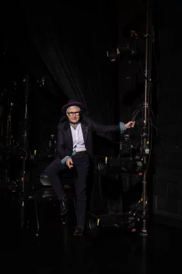 Frances Pruyn poses with theatre equipment.