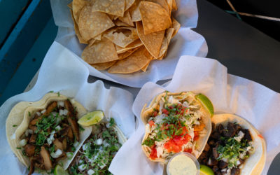 A platter of chips and salsa, pescado and carne asada tacos, and pollo and carne deshebrada tacos from Lone Star Taqueria in Cottonwood Heights, Utah.