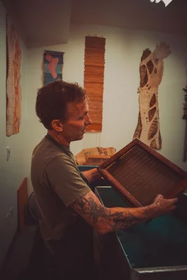 Andre Hoggan making paper