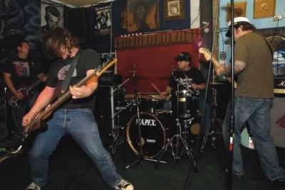 A live band plays at Burt's Tiki Lounge sometime around the 2000s.