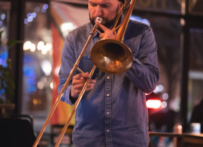 A man plays trombone at Hopkins Brewery's live jazz night.