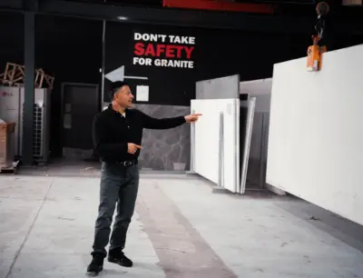 Ricardo Pazos standing in the granite facility