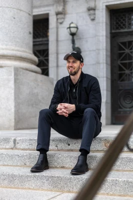 Michael Farrell sitting on the stairs at the Capitol