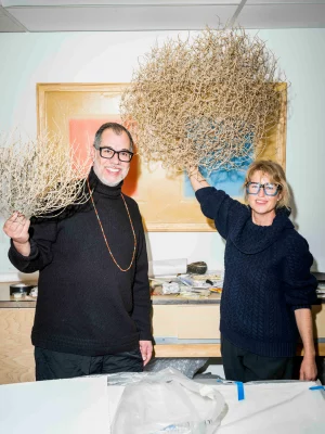 Colour Maisch and Jorge Rojas of Material Gallery hold up tumble weeds