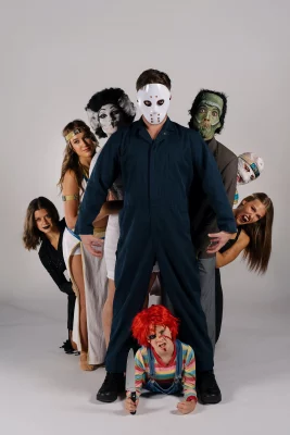Various characters from Thriller posing and standing behind each other.