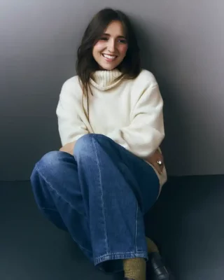 Ellie Fleming leaning up against the wall.