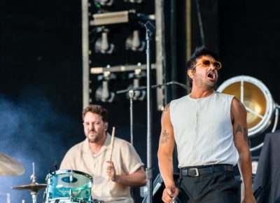 Singer Sameer Gadhia and drummer François Comtois of Young the Giant on stage at the Utah First Credit Union Amphitheatre. Photo: @lmsorenson