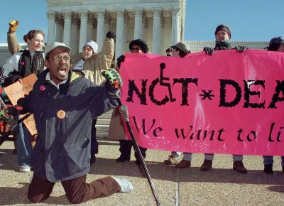 Gregory Dugan at a protest for disability rights.