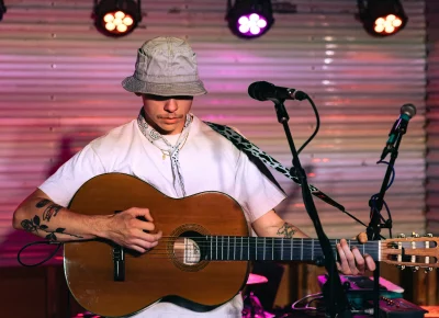 Quinn Christopherson starts strumming his guitar after fine tuning is complete, on-stage at Kilby Court on June 30.