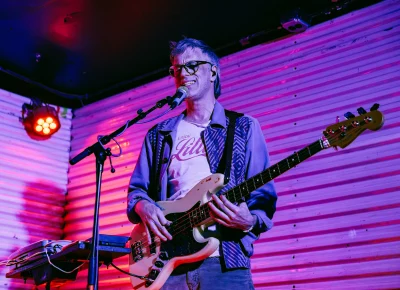 A bass player provides backup vocals for musician Samantha Crain on stage at Kilby Court in Salt Lake City on June 30.