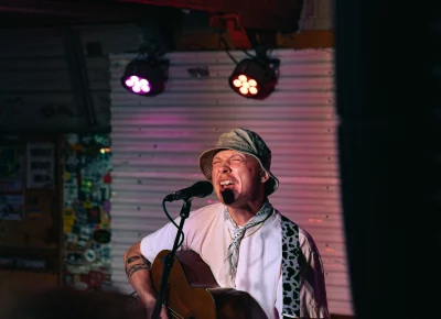 Quinn Christopherson singing solo on stage at Kilby Court in Salt Lake City on June 30.