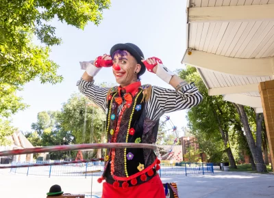 Styxx the Variety Performer holding performing holding his ears