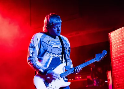 Connor Cummins of Snõõper playing guitar during the opening set for The Hives in Salt Lake City.