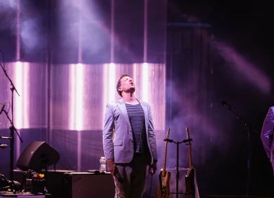 Lead singer Damian Kulash howling at the moon during the show, on stage in Salt Lake City, UT.