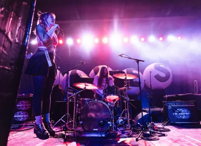 Snõõper lead singer Blair Tramel and drummer Cam Sarret on stage in Salt Lake City at the Union Event Center.