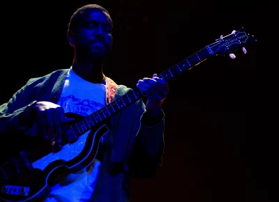 Big Thief bassist plucks his axe on stage at Library Square in Salt Lake City for SLC Twilight on Sept. 22.