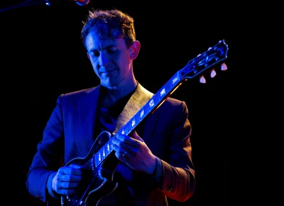 Big Thief guitarist Buck Meek plays on stage at Library Square in Salt Lake City for SLC Twilight.