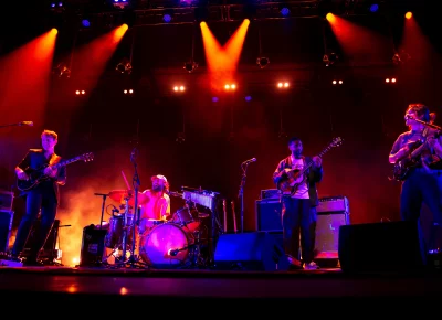 Big Thief on stage at Library Square for SLC Twilight.