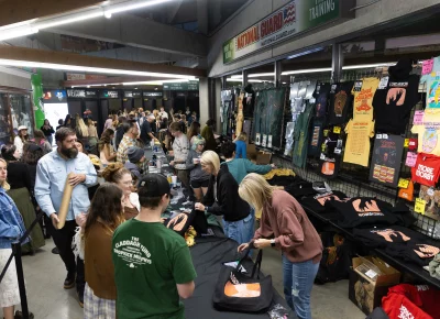 Fans pile into the hallways and create lines that flow past the doors and into the UCCU Center for their chance to get the merch they want!