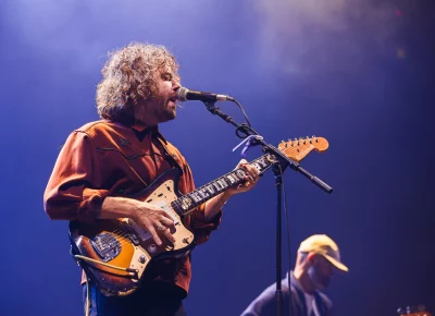Kevin Morby and bassist playing on stage during a live concert in Orem, UT at the UCCU Center.
