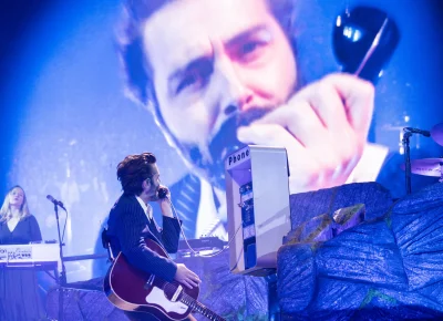 Lord Huron lead vocalist Ben Schneider picks up the payphone.