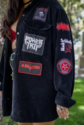 Close-up of Litzi Estrada showcasing her gothic-inspired fashion.