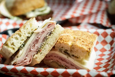 The "big easy" sandwich on a tray with red and white checkered paper underneath