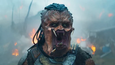 Schuster-Koloamatangi shrieks with his mouth open wide in his Predator makeup. Courtesy of Lawrence Gordon Productions