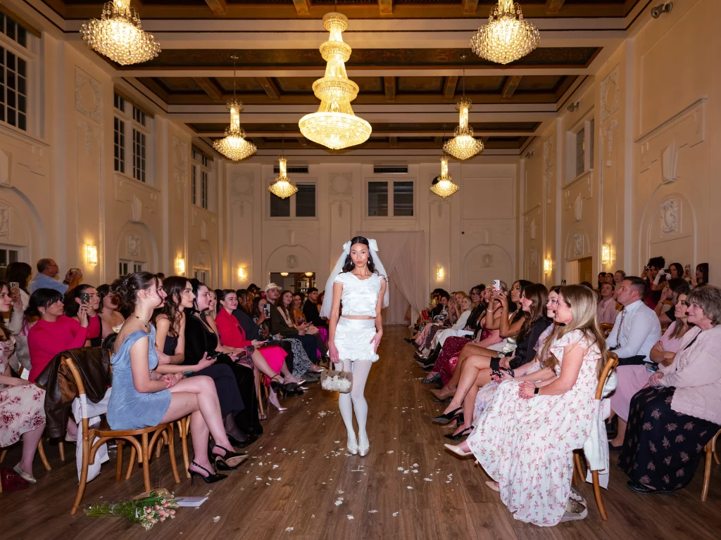 Hannah Tanne wears a dress from Hannah Ruth Zander's "Toast of the Town" bridal collection. Photo: Jillian Meyer