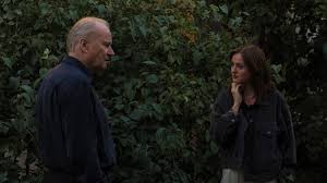 Stellan Skarsgård and Renate Reinsve talk in Joachim Trier's Sentimental Value.