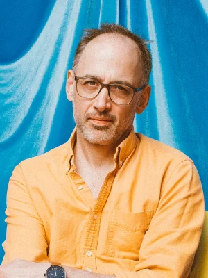 A portrait photo of writer-director David Wain.