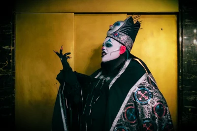 PJ Stinson also known as Daddy the Clown wearing full horror makeup and costume, including a long, ornate cape and faux crown.