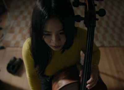 a woman plays violin in Rock Springs
