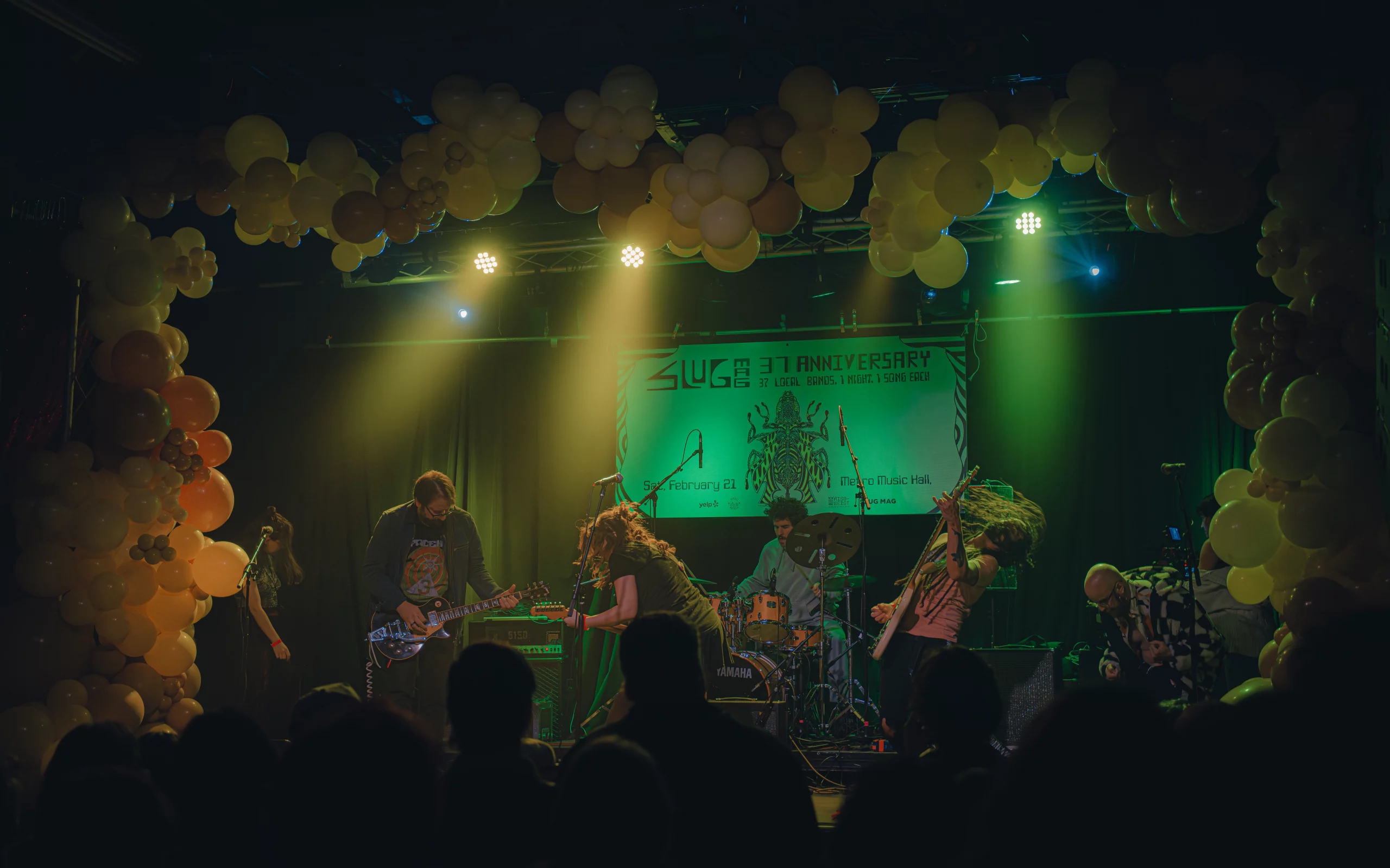 Sylke on stage at SLUG's 37th Anniversary Party