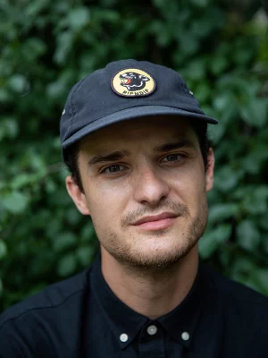 A portrait photo of director Charlie Tyrell.