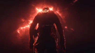 A figure staring at a red light.