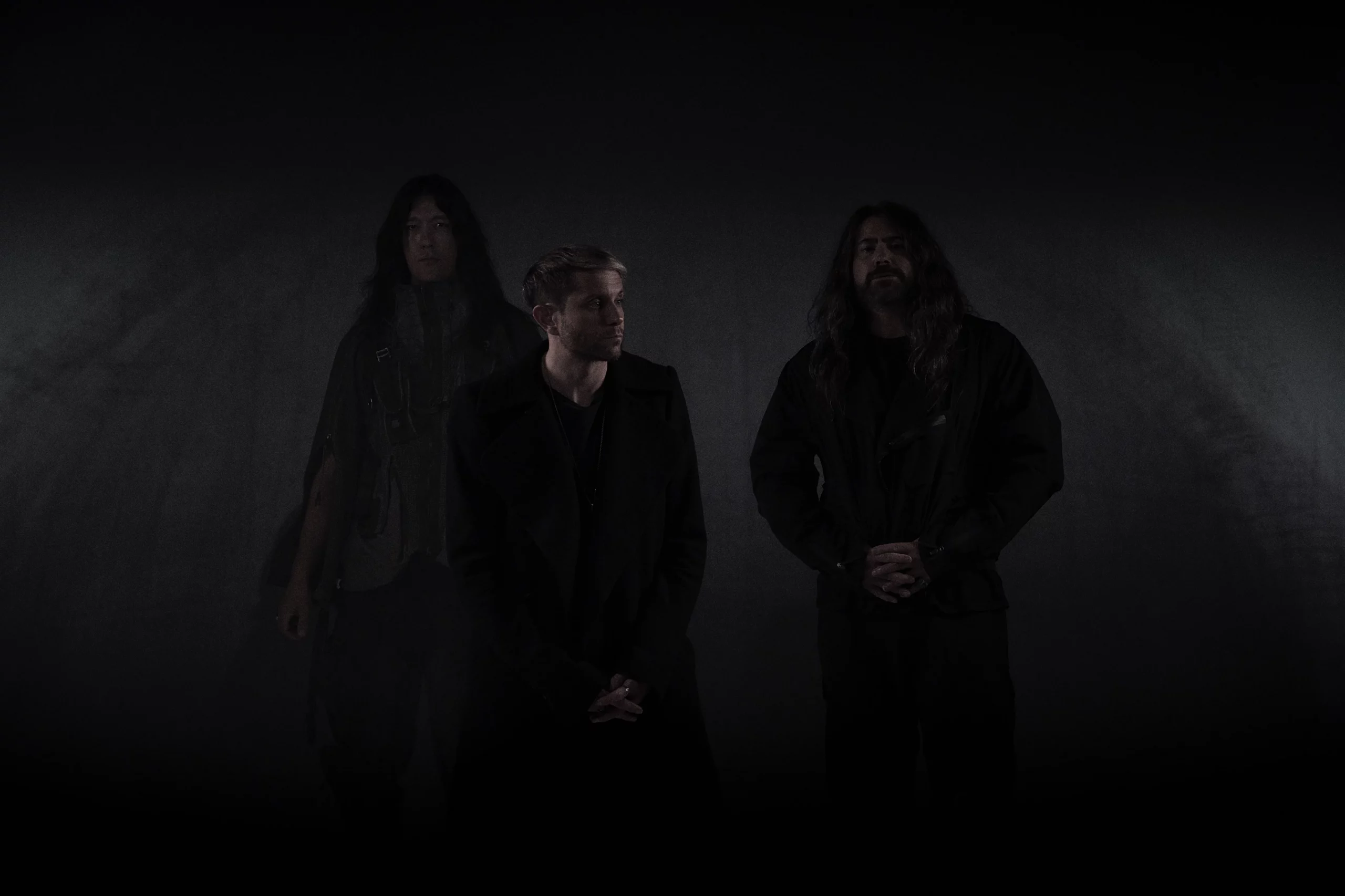 The three bandmates of HEALTH.